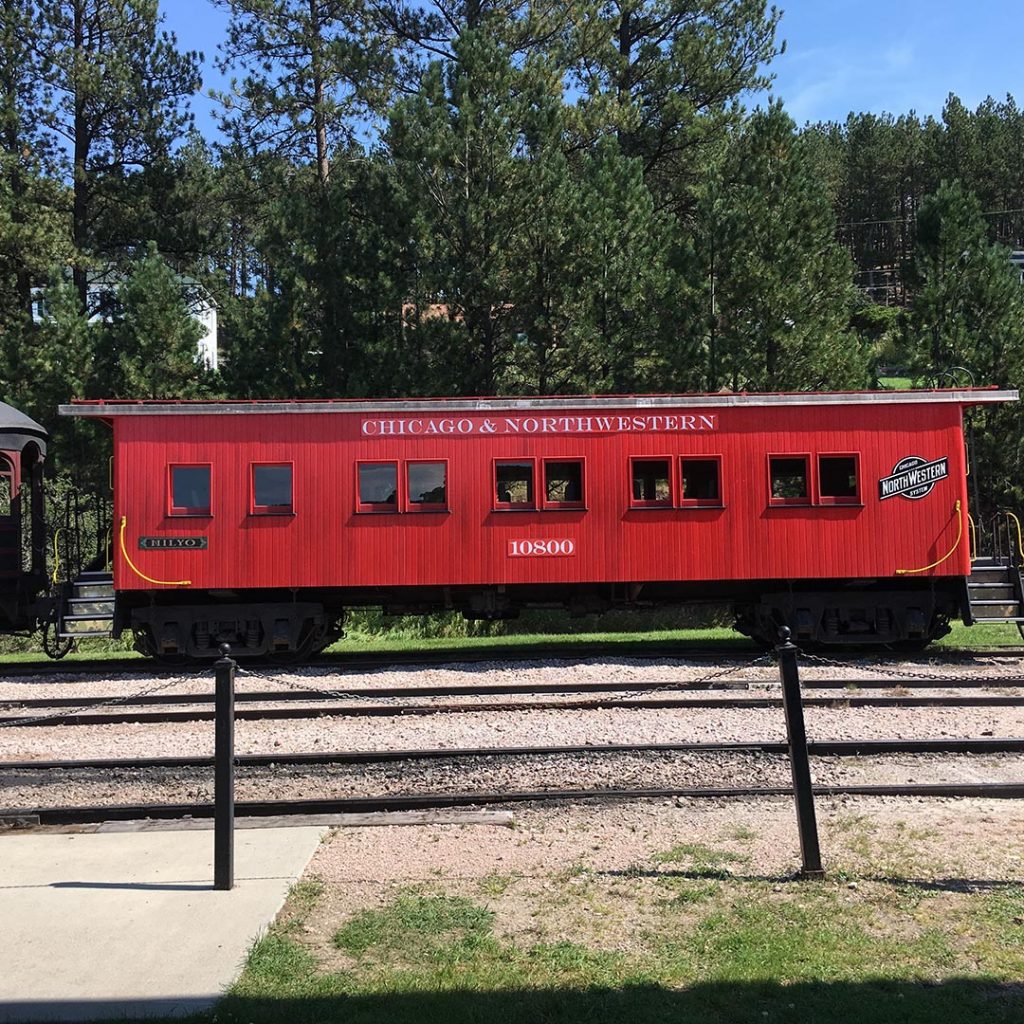 Another passenger car rarity is this Chicago & North Western drover's caboose.